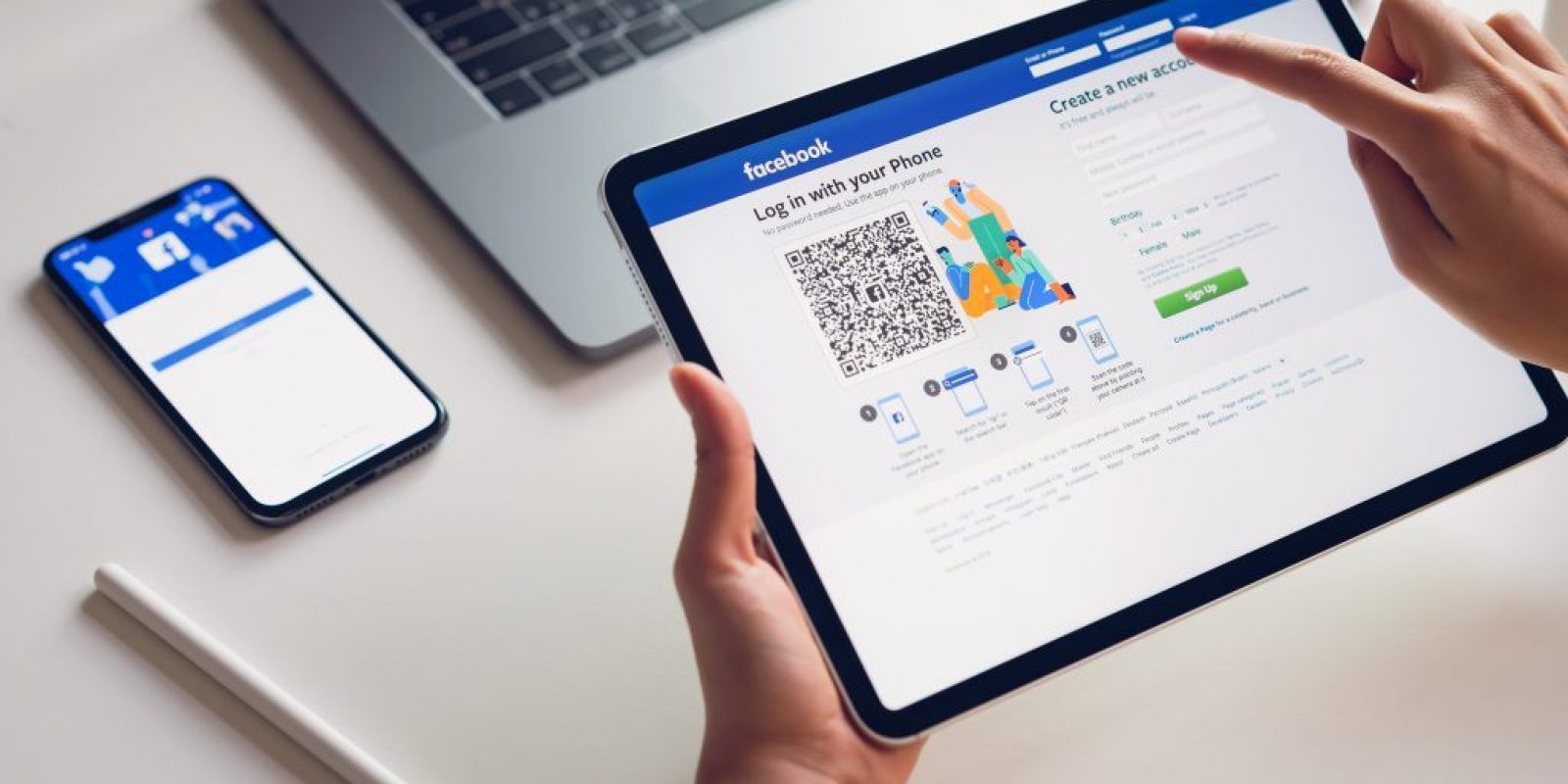 Bangkok, Thailand - February 07, 2019 : hand is pressing the Facebook screen on apple iphone x ,Social media are using for information sharing and networking.