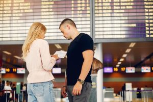 Beautiful couple standing in a airport