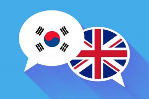 Two white speech bubbles with South Korea and Great britain flags.